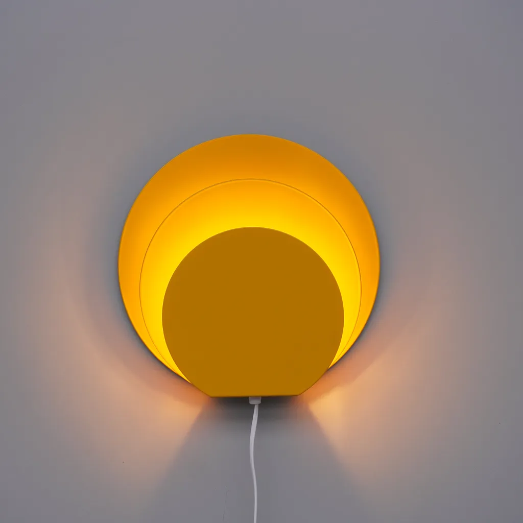 Wall light 'Delta' in lacquered steel (golden yellow)