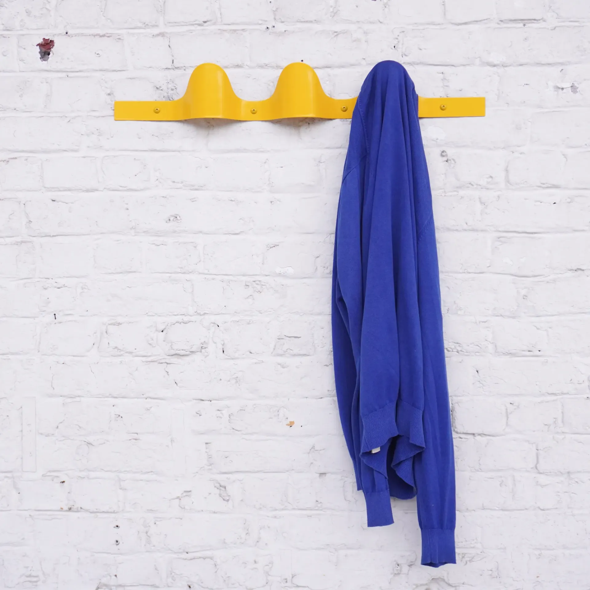 Coat rack 'Waves' by Denis Romainville (golden yellow)