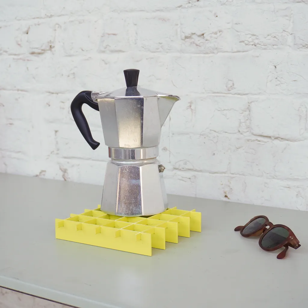 Trivet by Denis Romainville (sulfur yellow)