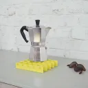 Trivet by Denis Romainville (sulfur yellow)